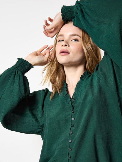 Ruffled collar blouse